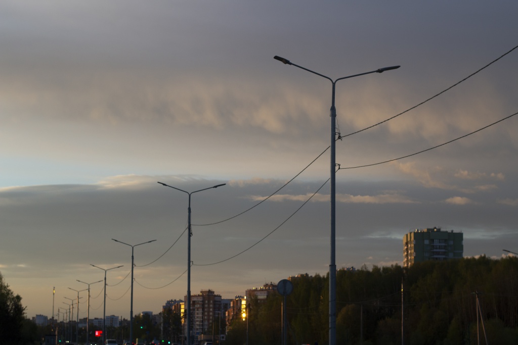 silhouette-street-amidst-buildings-against-sky-dusk.jpg